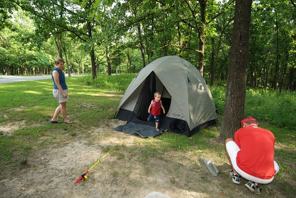 A family outside their tent.