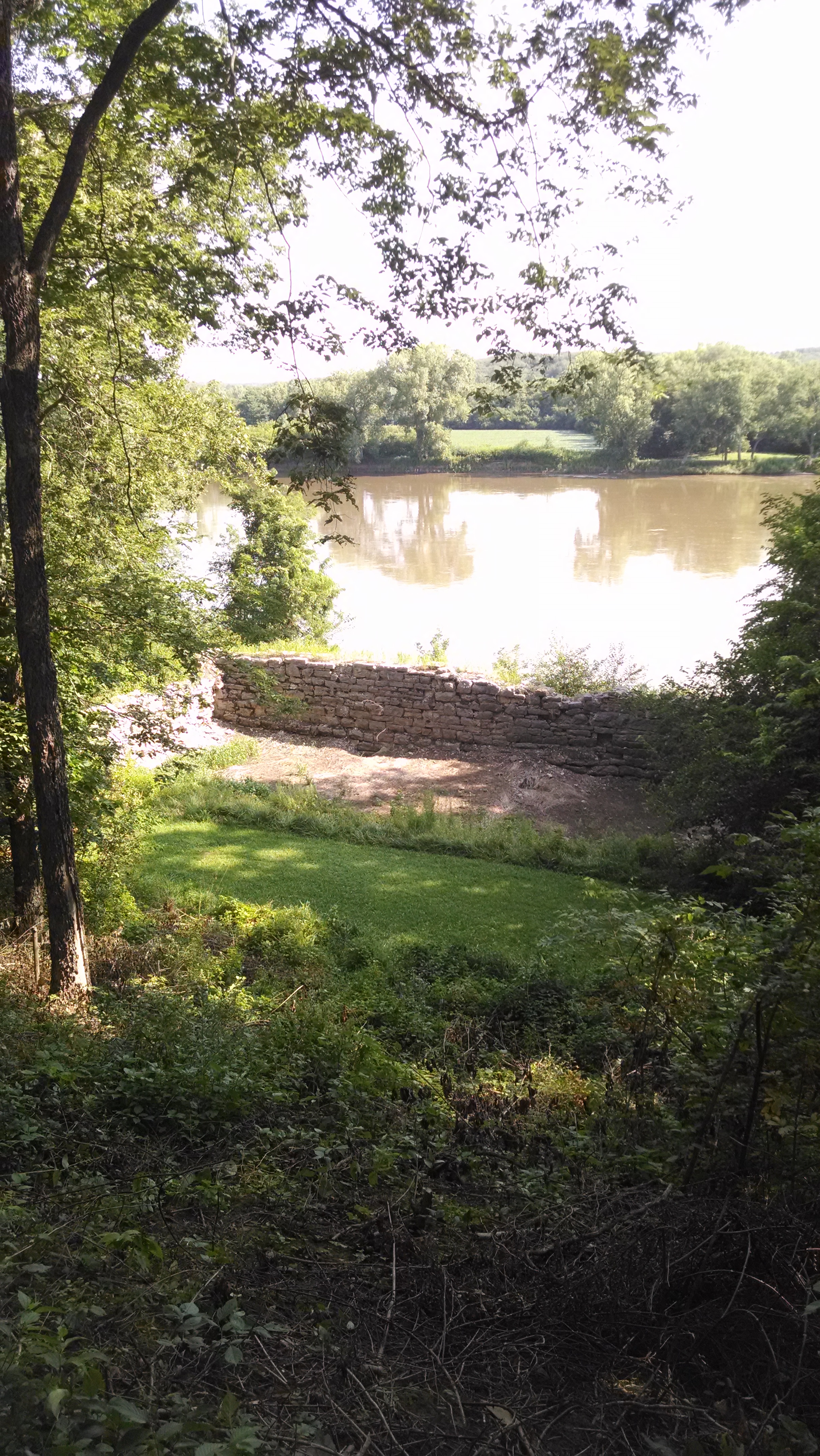 rock mill ruins with river in the background