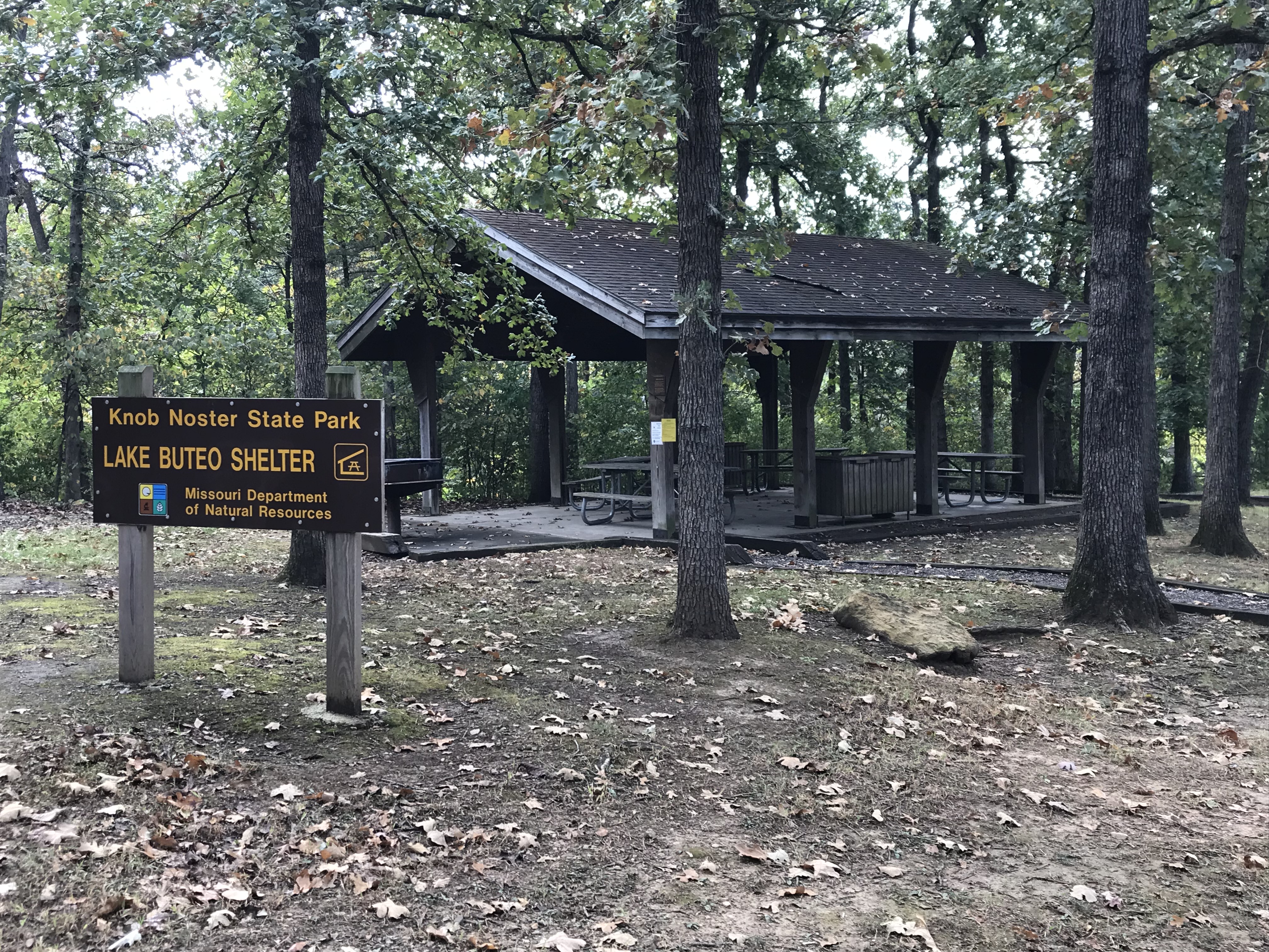 Picnic shelter with Lake Buteo Shelter sign in front