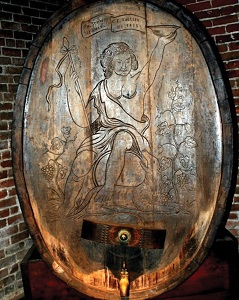 old wood wine cask with carving on front
