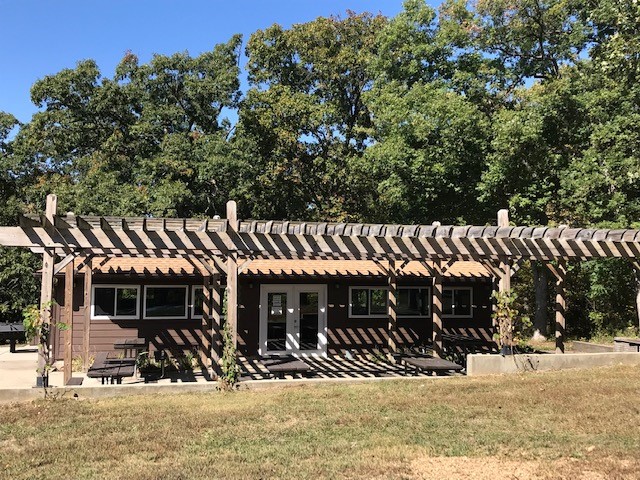 Outdoor patio next to the enclosed shelter