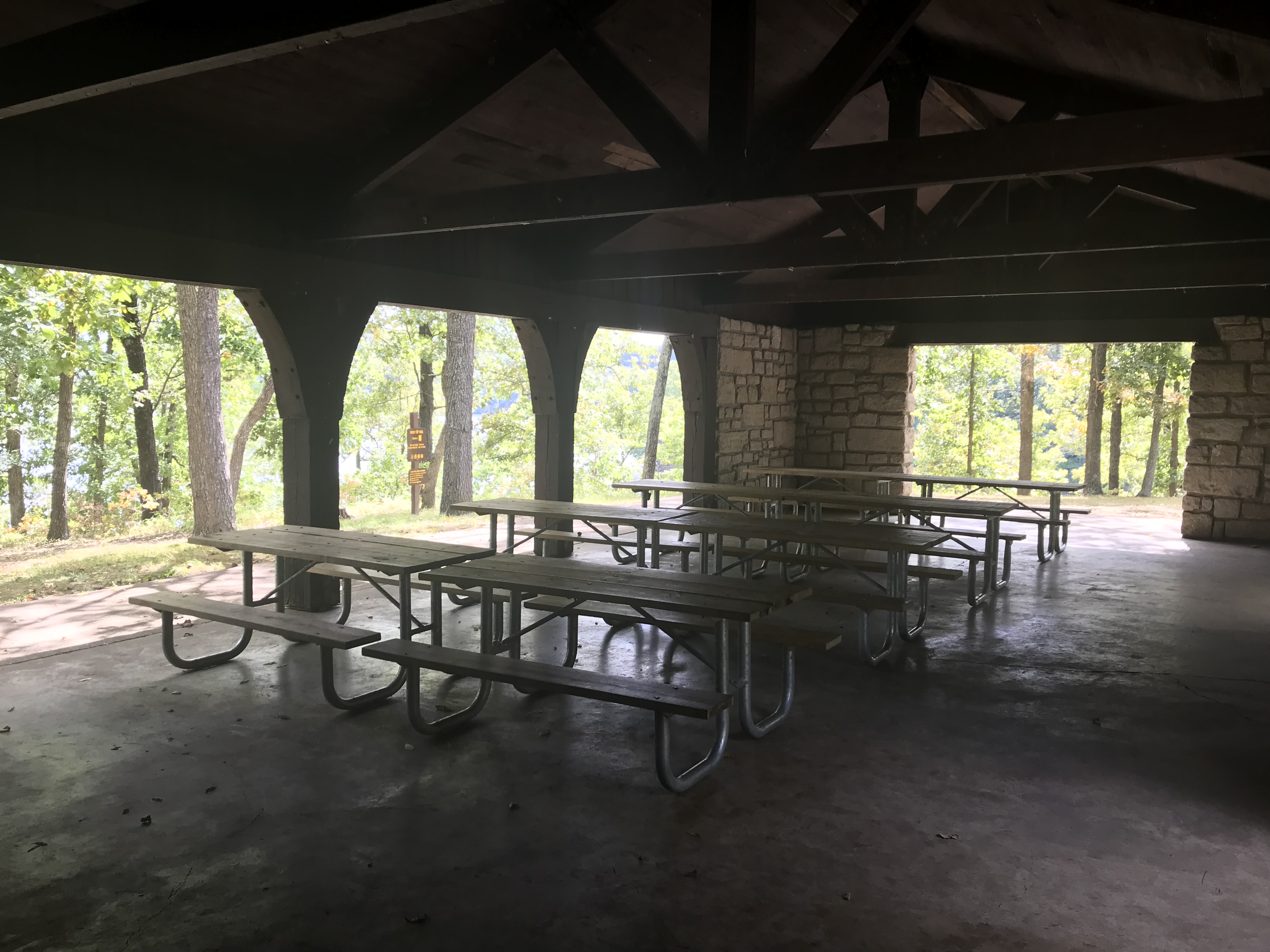 Picnic tables inside the open shelter