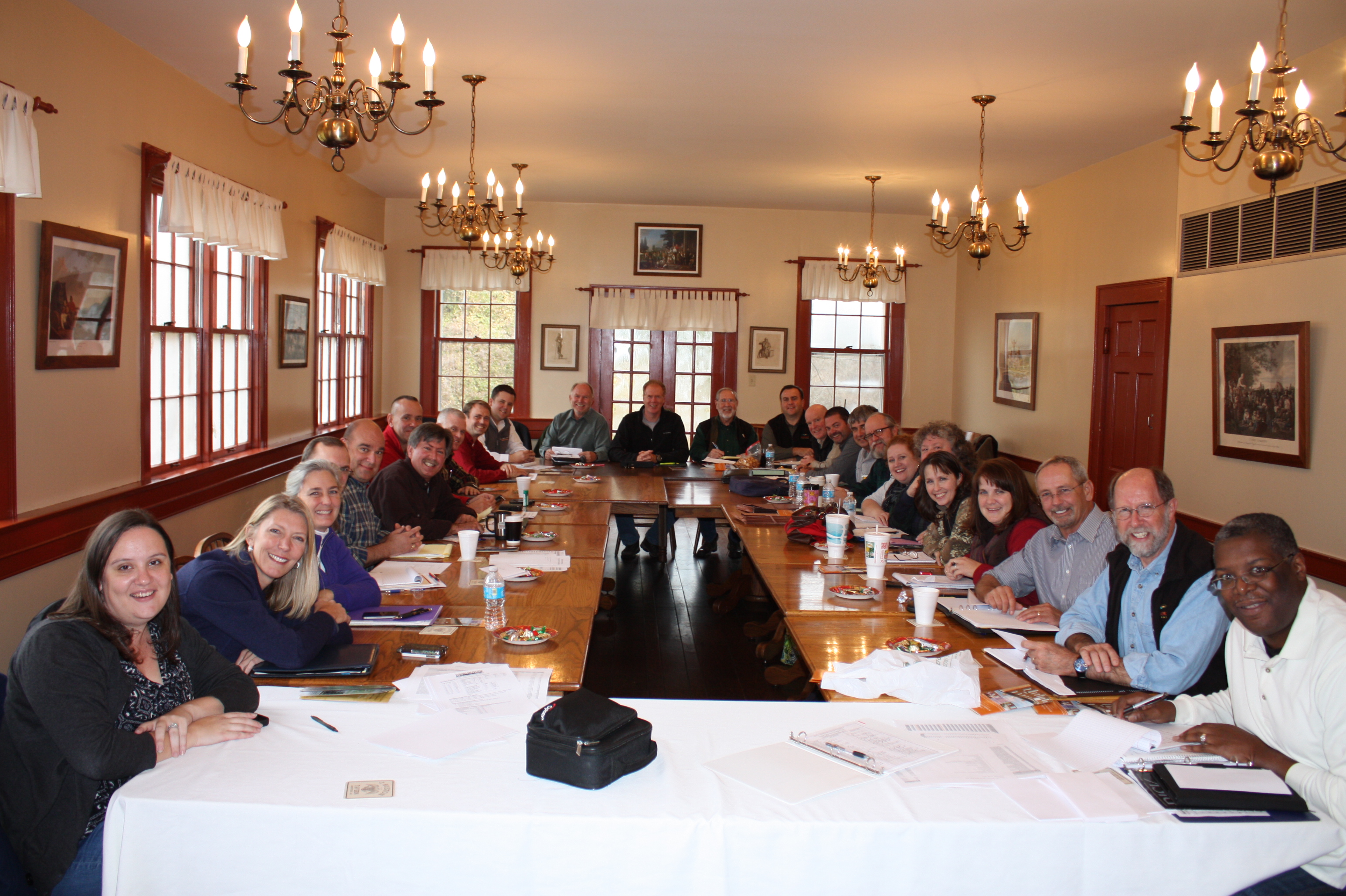 People sitting around a table during a meeting 