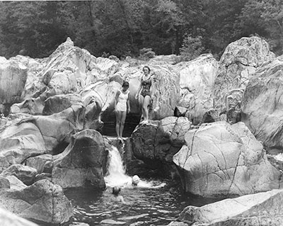 historic photo of two women swimming at Johnson's Shut-Ins State Park