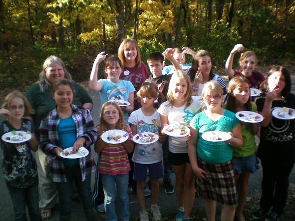 kids showing off a project made during a program