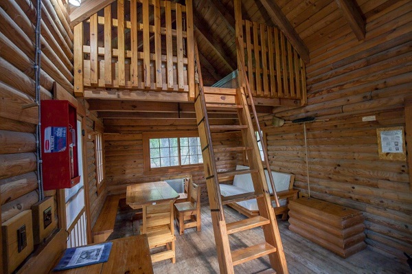 ladder to loft inside one of the cabins