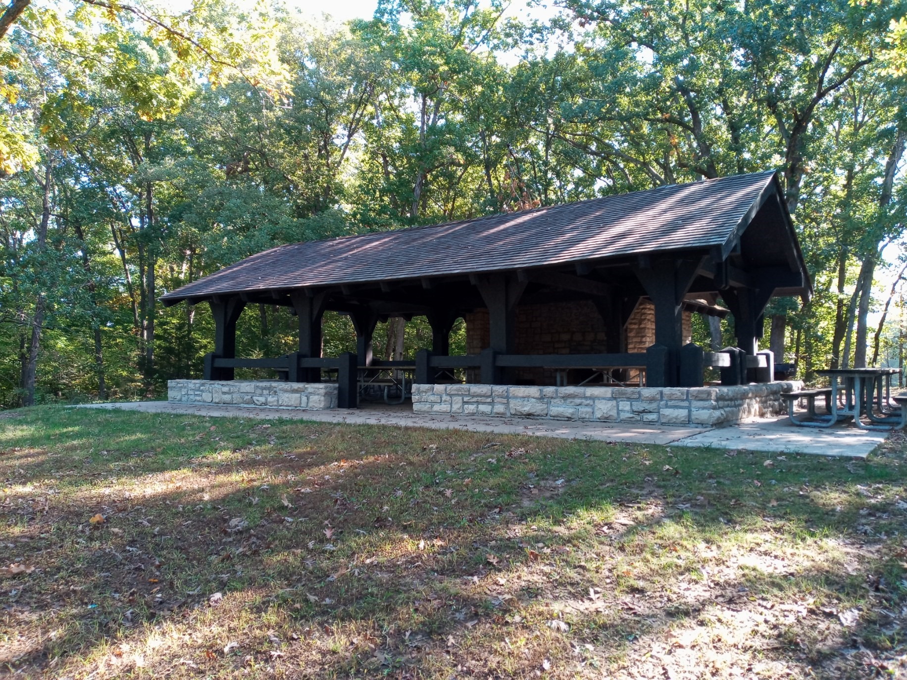 CCC open picnic shelter under trees