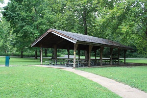 picnic sheler with sidewalk leading to it