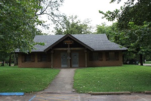 exterior of the showerhouse and sidewalk leading to it