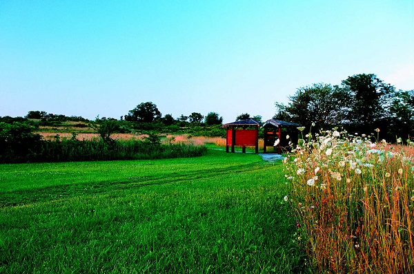 interpretive panels sit at the start of the site's interpretive trail