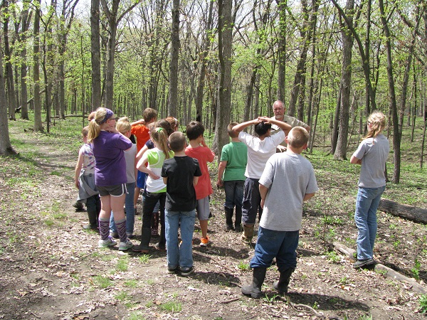 a group of kids on a nature hike