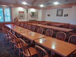 long tables with chairs inslide one of the meeting rooms