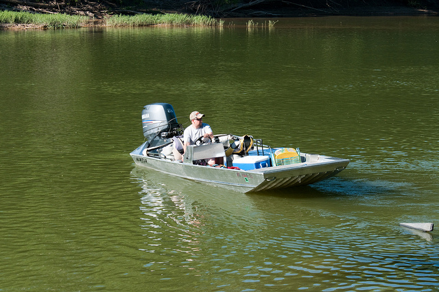 a man in a boat on the river