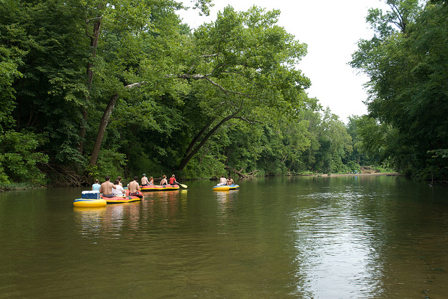 several rafts floating on the river