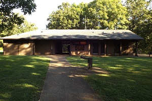 sidewalk leading to showerhouse and water fountain