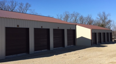 two storage buildings with four units in each