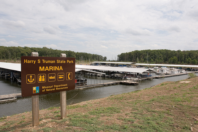 marina sign with the many boat slips in the background