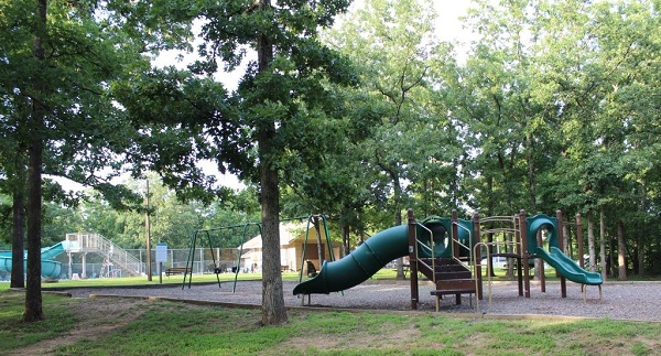 Playground equipment with slides