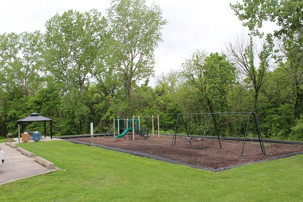 a swing set and slide 