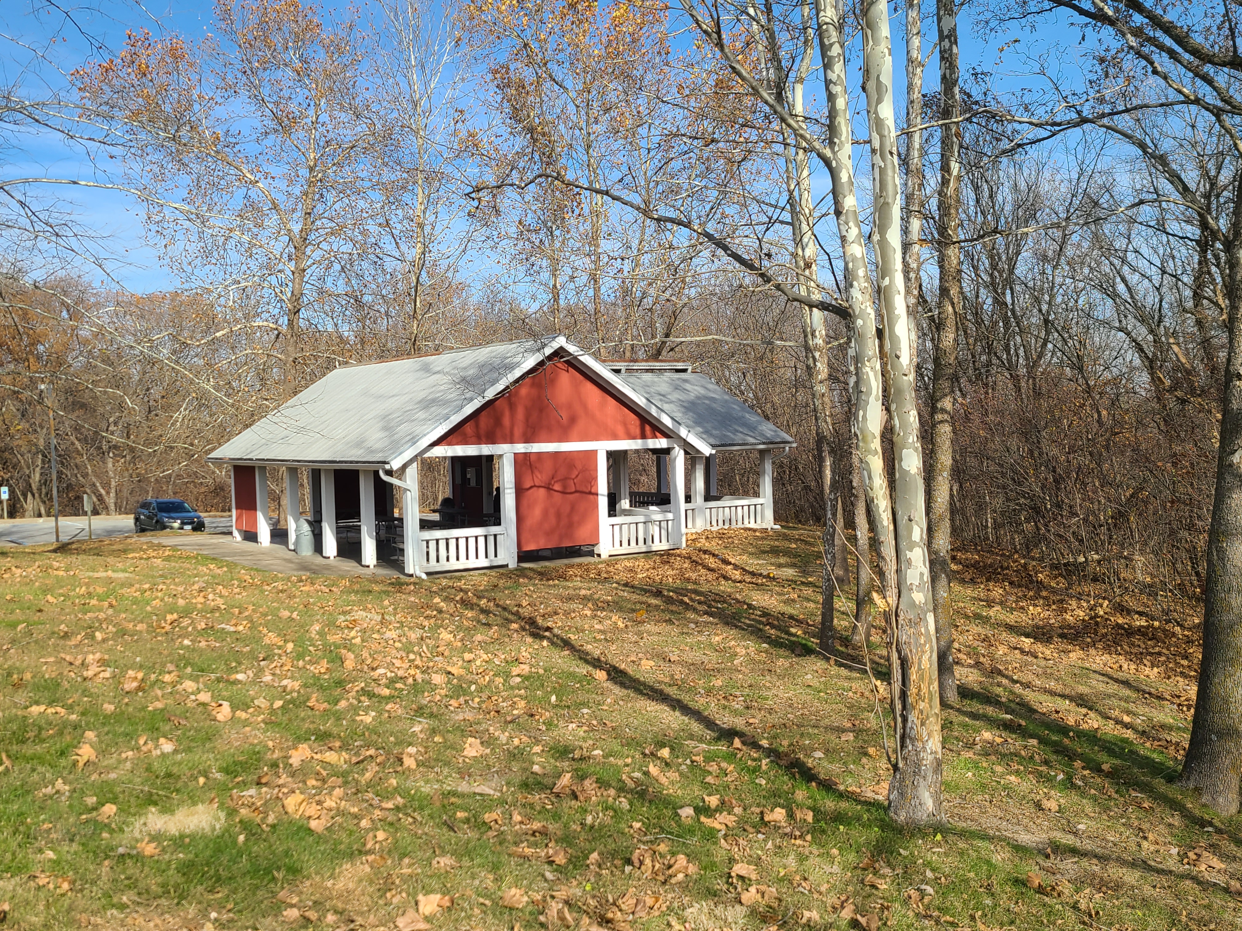 Open picnic shelter and parking lot