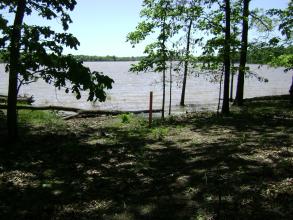 A backcountry camping site next to a river