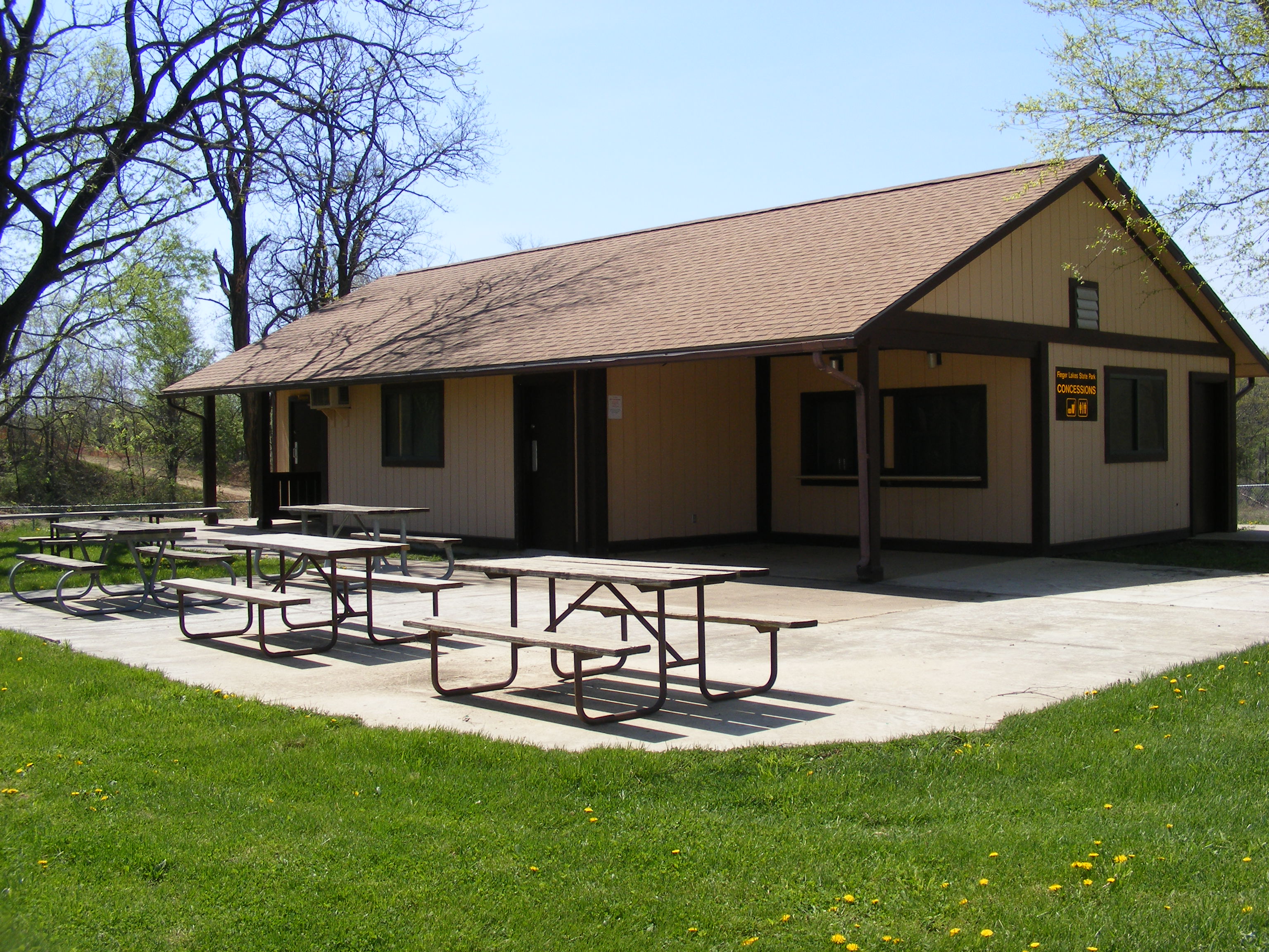 Picnic tables and exterior of the enclosed shelter
