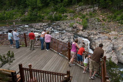 people standing on the overlook above the shut-ins