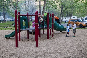 kids playing on multi-activity playground