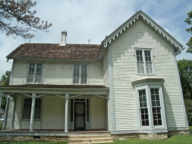exterior of the two-story white home