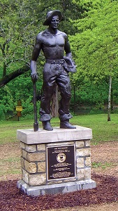 bronze statue of Civilian Conservation Corps member