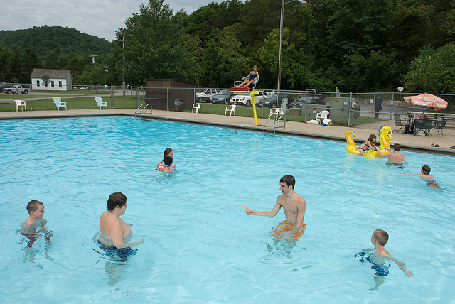 Kids playing in a swimming pool