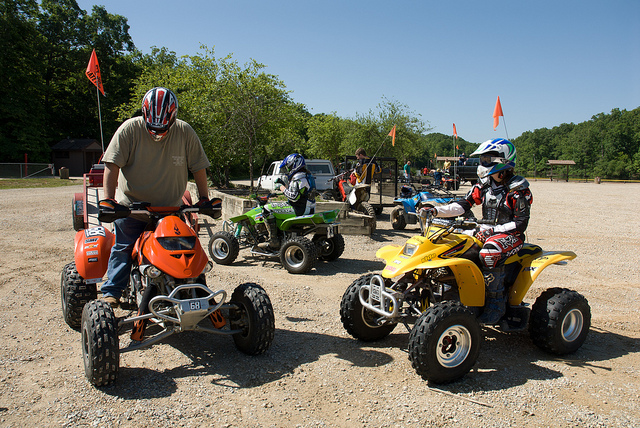 several four-wheelers in the staging area