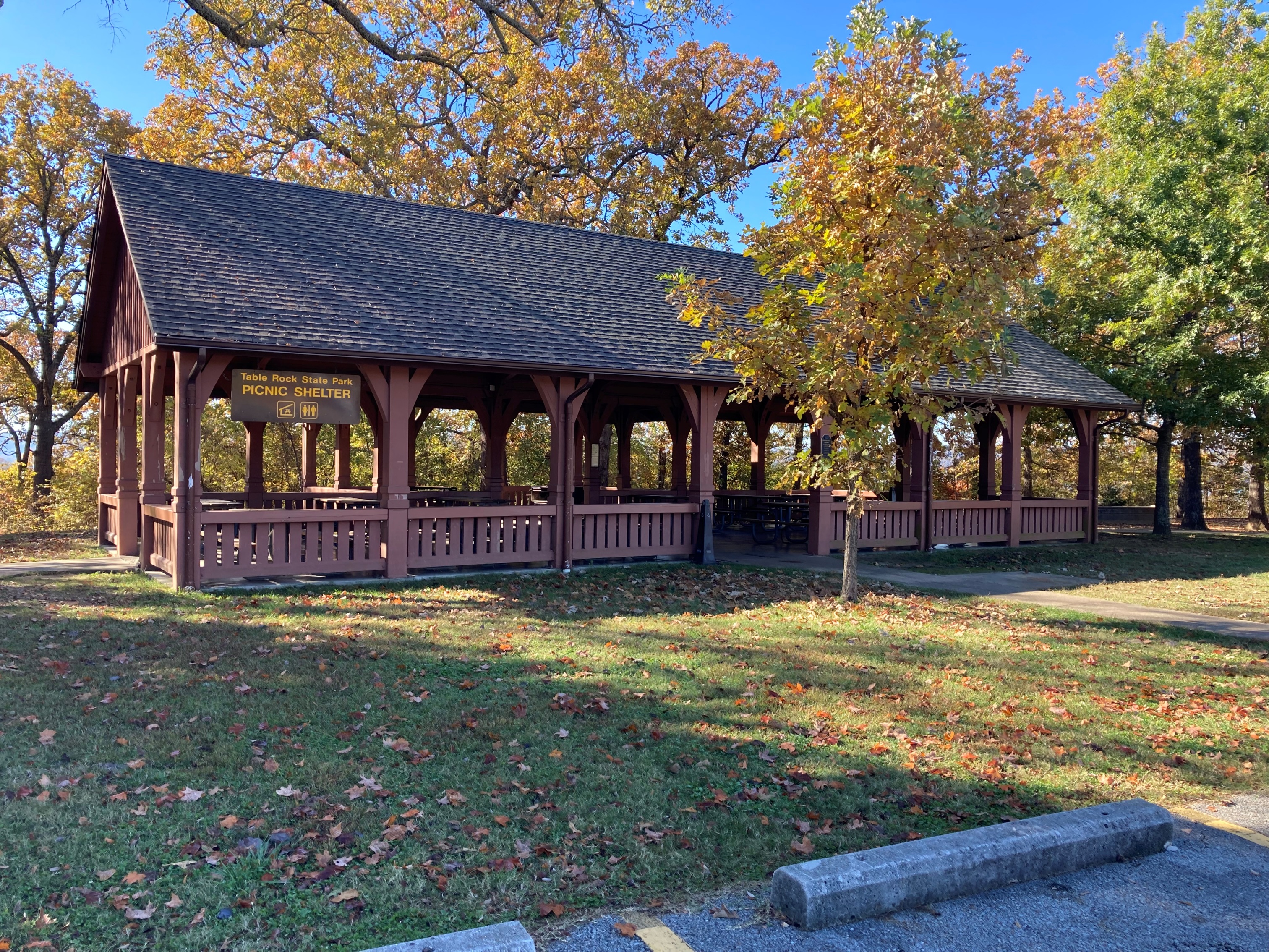 Open picnic shelter and sign