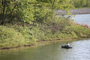 a man in a kayak on the lake