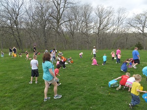 kids hunting Easter eggs