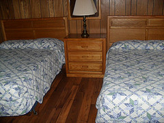 two beds inside a cabin