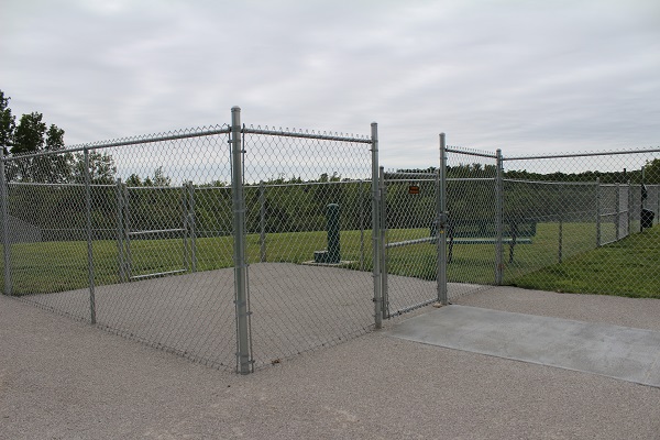 one of the fenced in pens for dogs